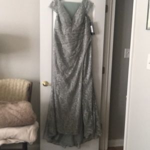 Never worn.  Size  14.  Color is Silver/Sage.